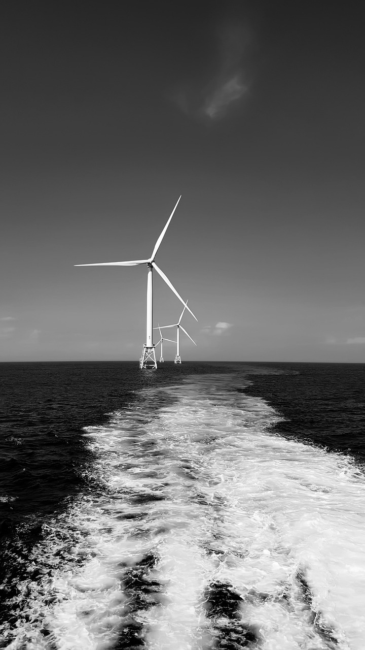 sea, ocean, boat wake, wind turbines, energy, green, ecological, nature, sky, black and white, gray energy, gray boat
